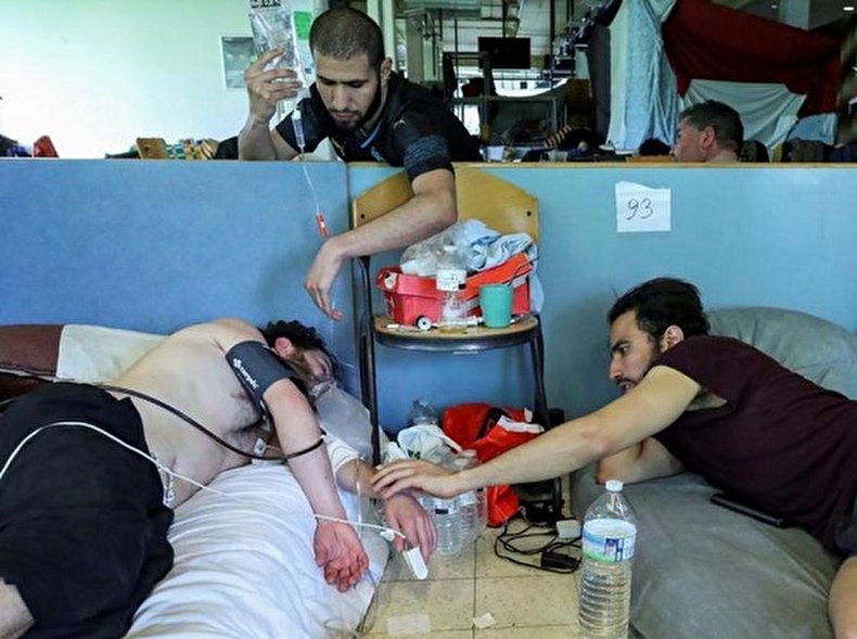 پناهجویان معترض در بلژیک لب‌های خود را دوختند